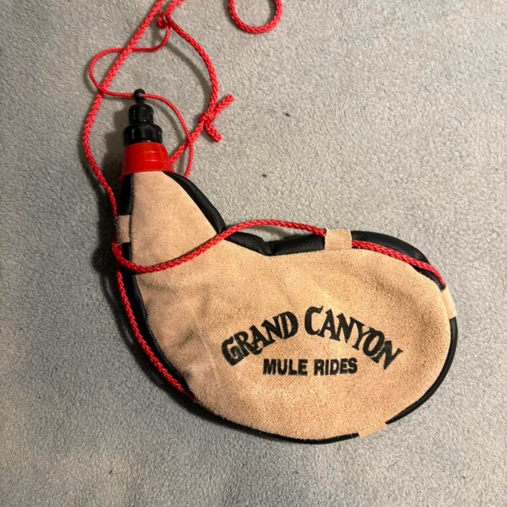 Tan and black Grand‎ Canyon Mule Rides water bottle